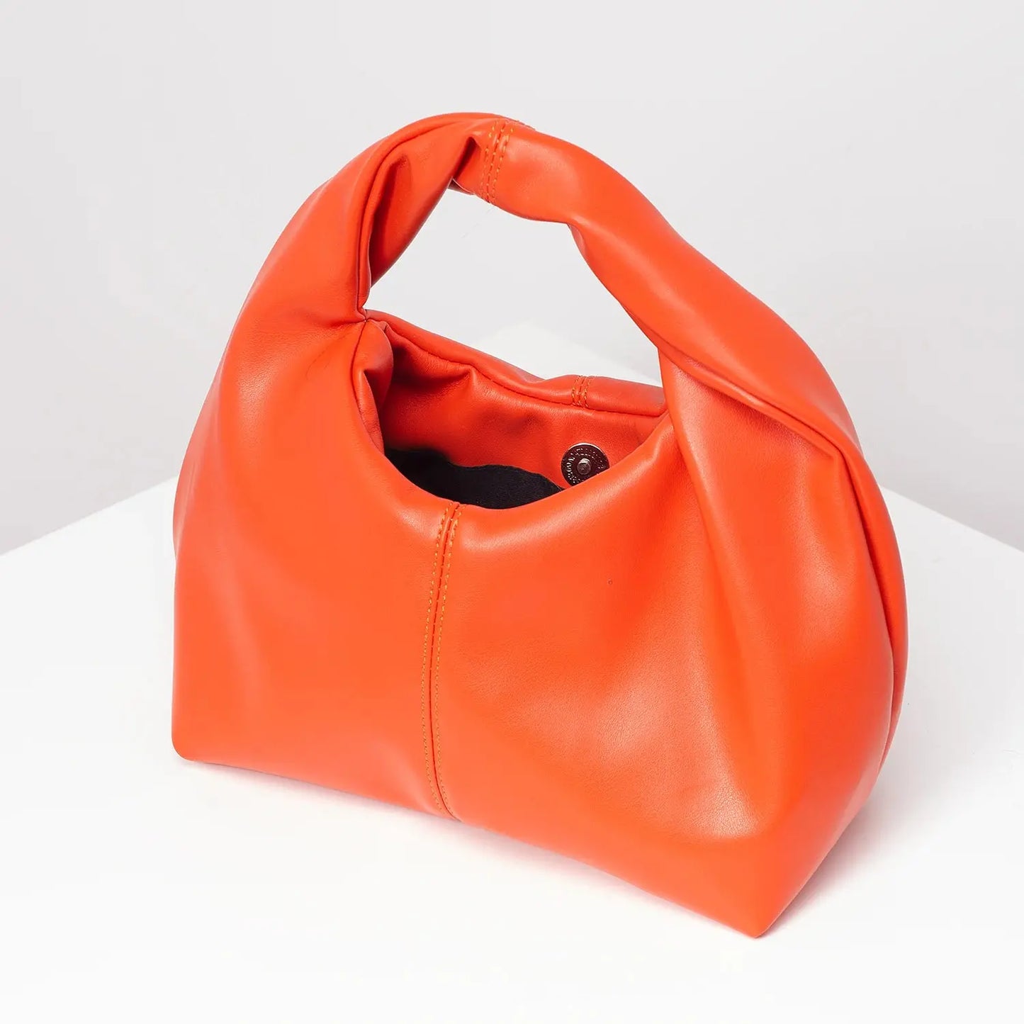 Stylish twist square bag, solid color top clutch bag, simple and versatile commut Little Addiction